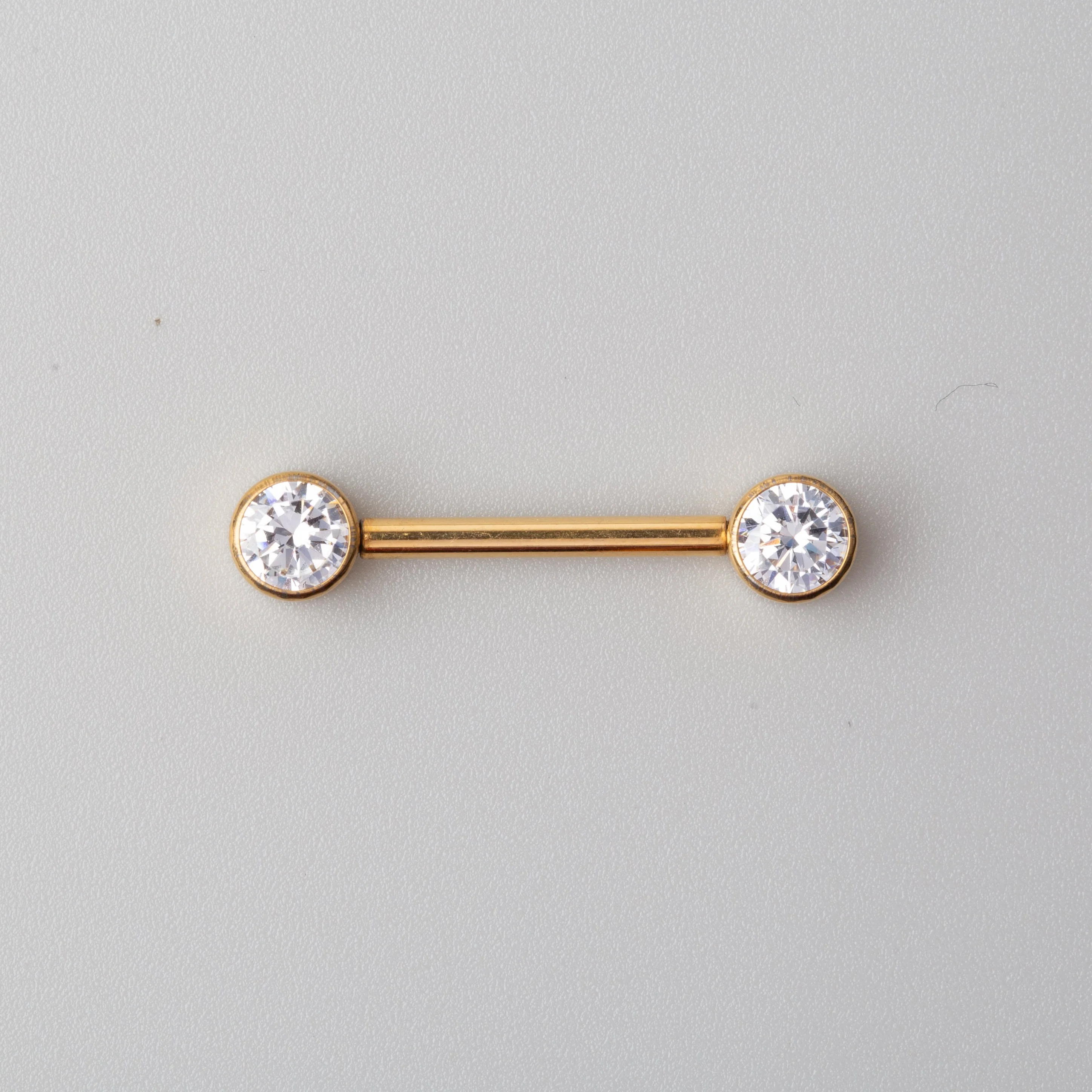CZ Nipple Barbell in Gold - Titanium