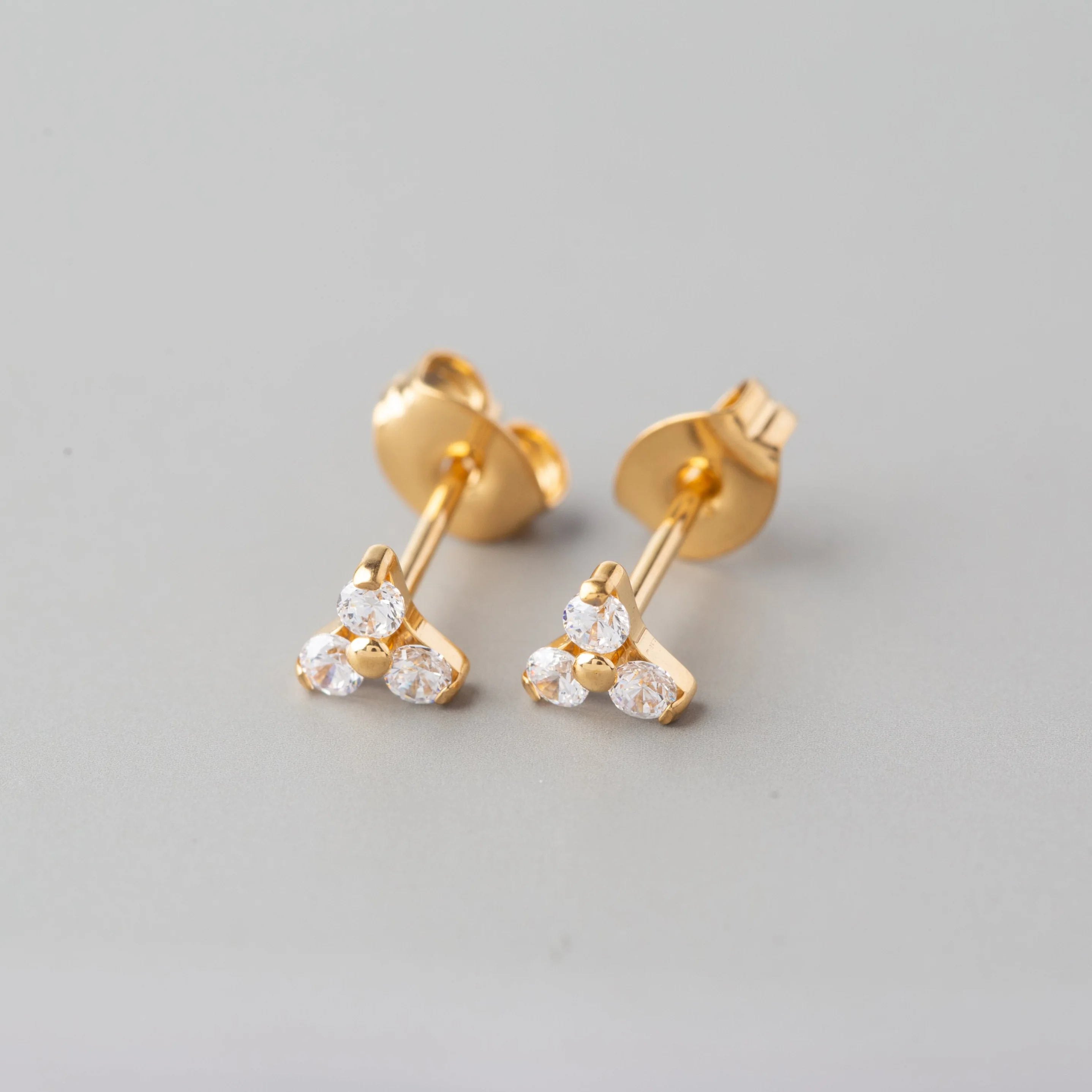 Triple Blaze CZ Stud Earrings in Gold - Titanium